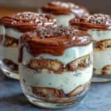 Individual Black Sesame Tiramisu Cups: rich mascarpone cream and toasted sesame seeds atop coffee-soaked ladyfingers.