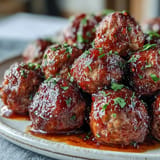 Tempting hot honey peach meatballs served warm, a perfect appetizer or main.