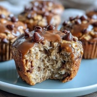 1. No-bake peanut butter oat bites with mini chocolate chips, a wholesome and satisfying snack perfect for on-the-go.