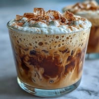 Creamy Horchata Espresso Cloud drink, layered and topped with fluffy frothed milk.